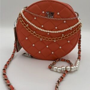 Badgley Mischka Coral around a crossbody with Pearl accent new with tags